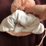 Bonnet gros pompon tricoté en coton avec oreillettes pour bébé
